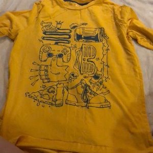 Yellow long sleeve T-shirt.